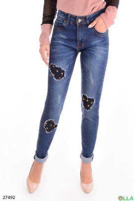 Женские джинсы с заклепками